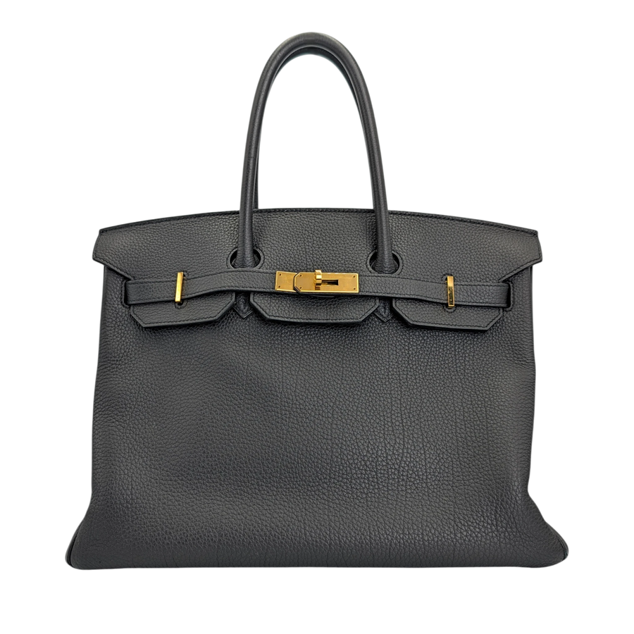 Secondhandbags AG Hermès Birkin 35 Handtasche aus schwarzem Togo-Leder mit goldener Hardware und ikonischem Verschluss