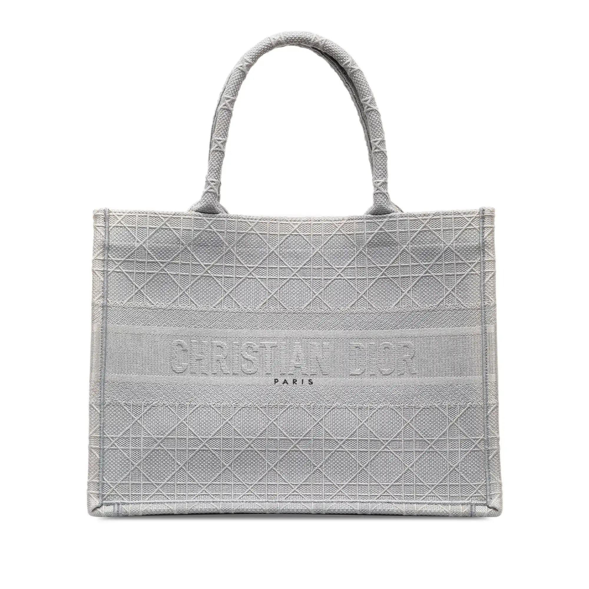 <h1>The Symbolism of Elegance: Christian Dior's Book Tote in gray – a tribute to the Cannage tradition</h1>