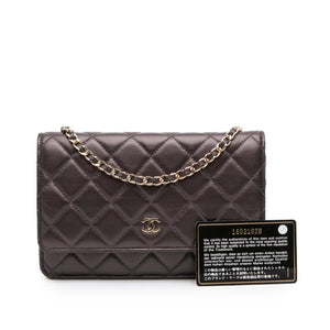 Die Zeitlose Eleganz: Chanel Boy WOC in Braun mit Goldakzenten