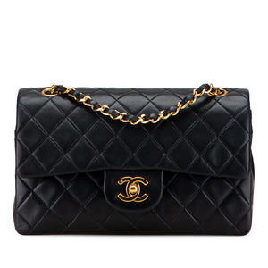The Legacy of Coco: The Chanel Classic Double Flap in Black Lambskin with Gold Accents