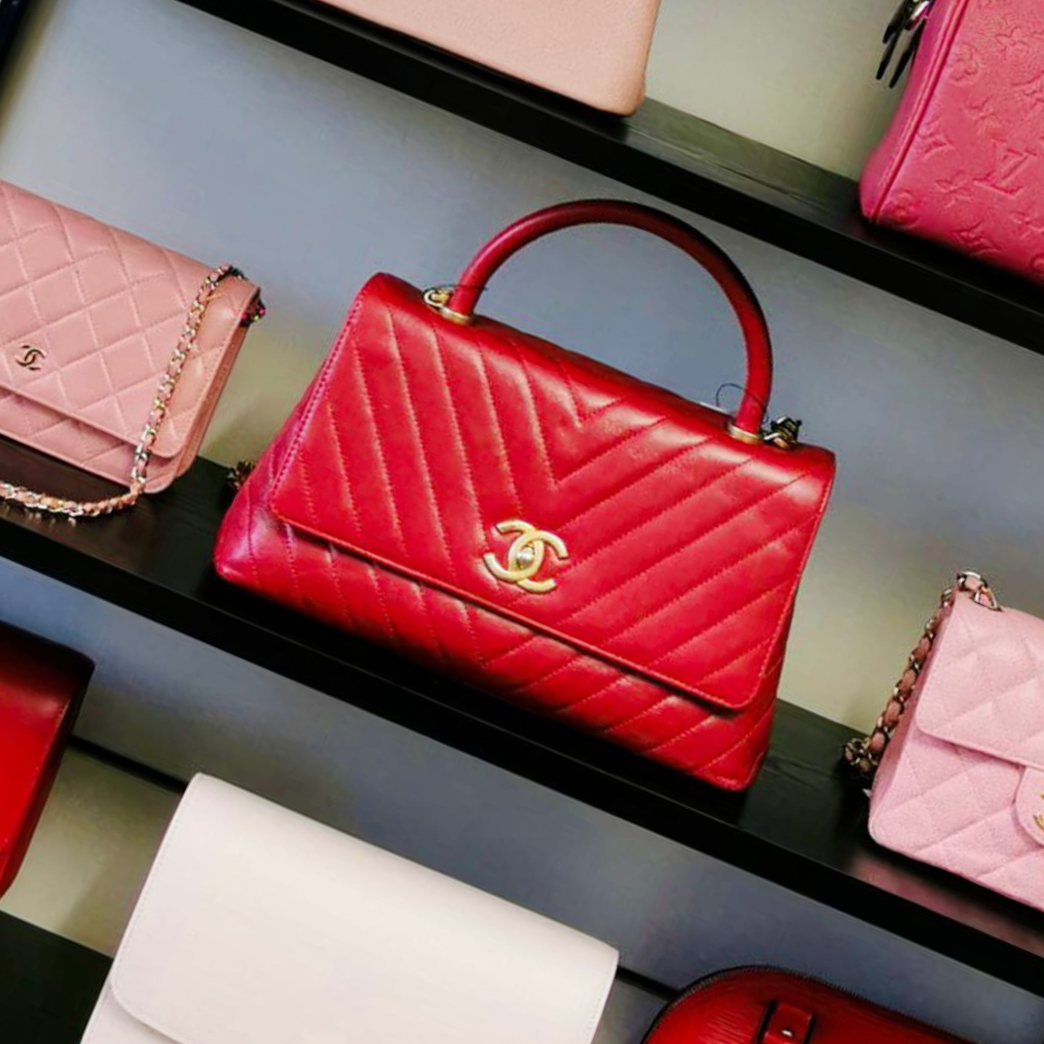 Chanel Top Handle Bag Red Matelassé Chevron Lambskin / Photo by Secondhandbags