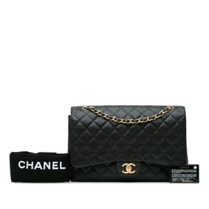 Chanel Classic Double Flap Maxi Black Caviar Gold