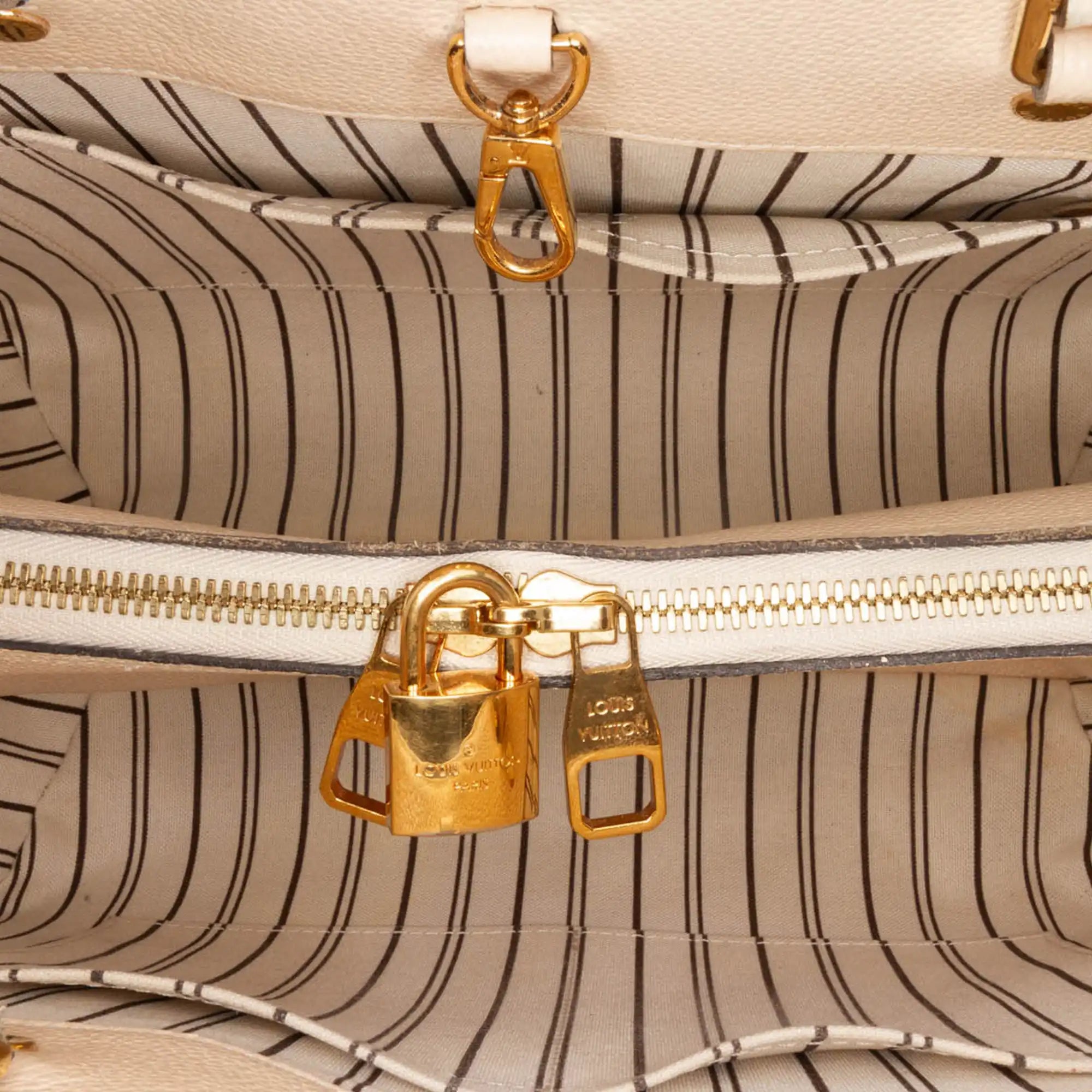Louis Vuitton MontAigne mm beige Monogram Empreinte
