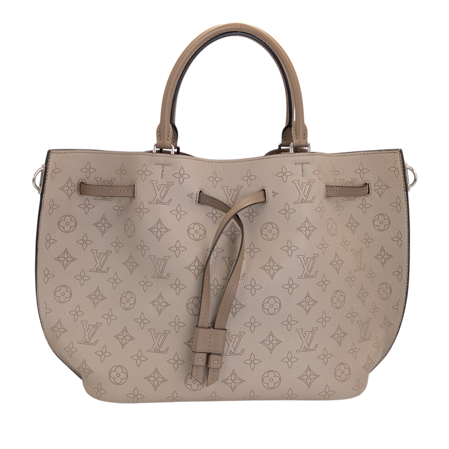 Secondhandbags AG Louis Vuitton Bella tote in beige perforated Mahina leather with drawstring closure and top handles.
