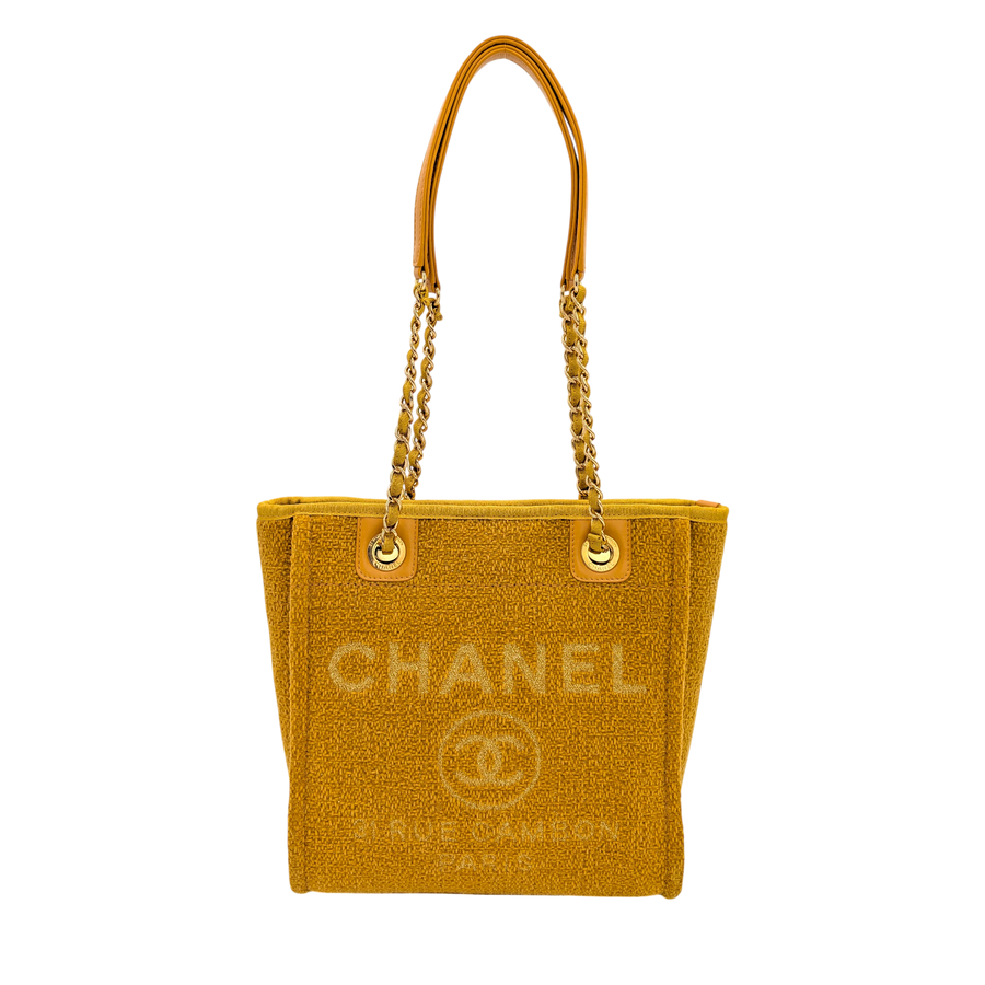 Secondhandbags AG yellow tweed Chanel Deauville tote with chain straps and leather handles. Medium size.