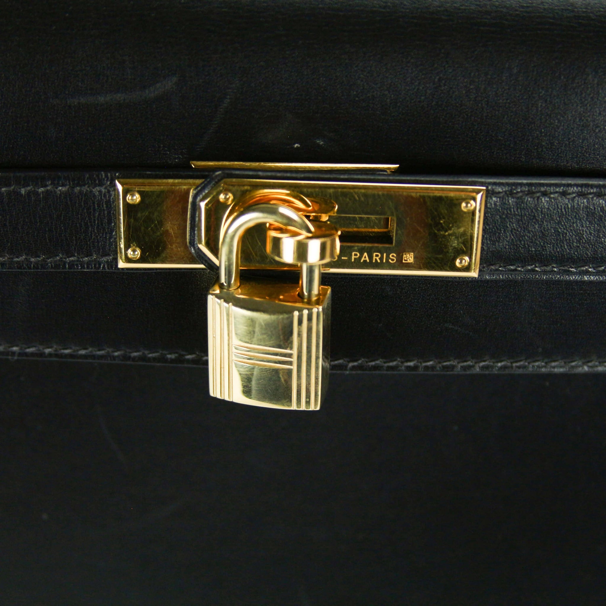 Hermès Kelly 35 Black Boxcalf Gold - Secondhandbags AG