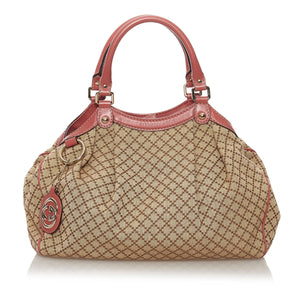 Gucci's Biggest Celebrity Fans  Brown Gucci Medium Diamante Sukey